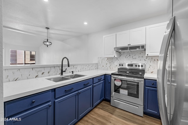 kitchen featuring hanging light fixtures, stainless steel appliances, white cabinetry, blue cabinets, and sink