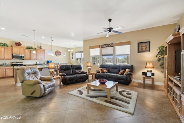 tiled living room featuring ceiling fan