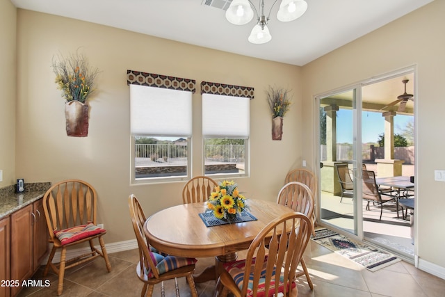 dining space featuring tile patterned floors