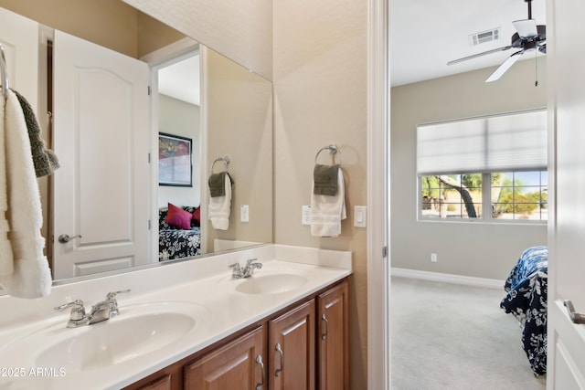 bathroom featuring vanity and ceiling fan