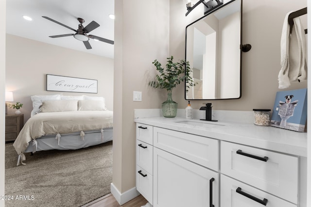 bedroom with sink and ceiling fan