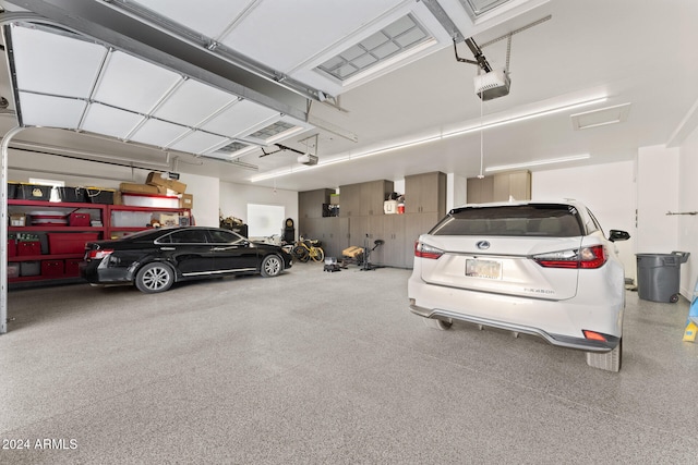 garage featuring a garage door opener