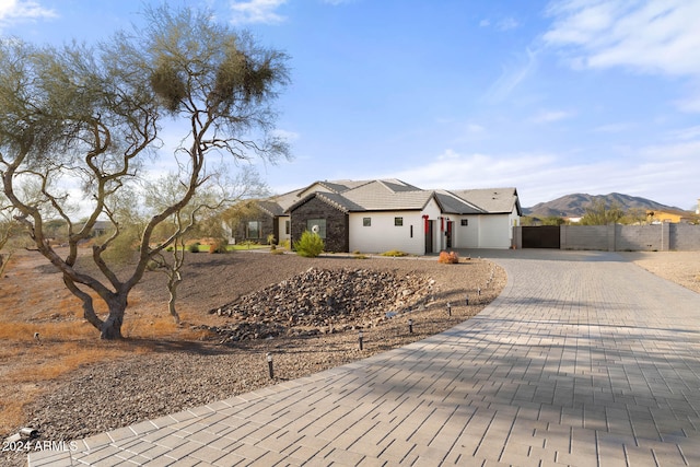 single story home with a mountain view