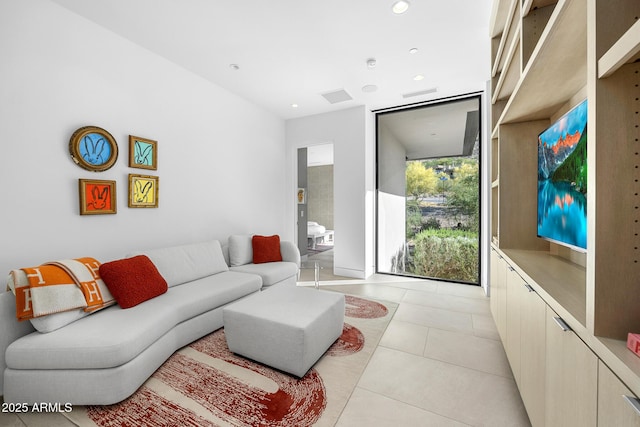 living room featuring light tile patterned floors