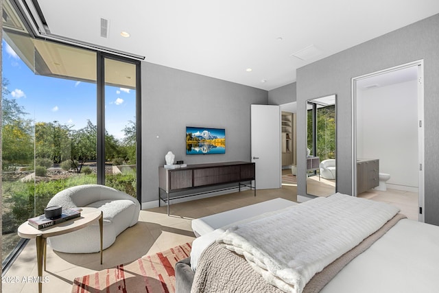 bedroom featuring a wall of windows