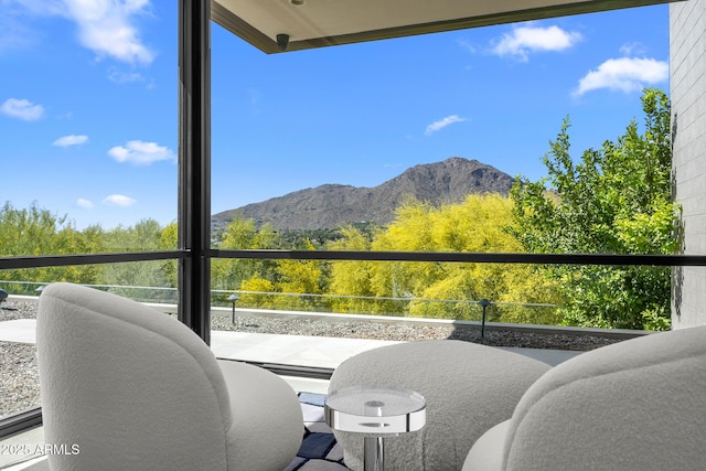 balcony featuring a mountain view