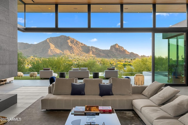 interior space featuring outdoor lounge area and a mountain view