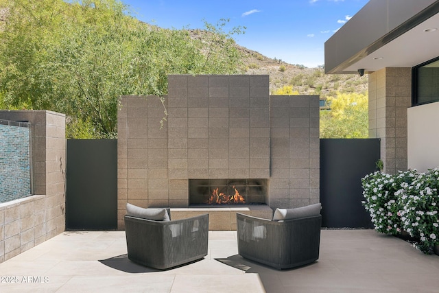 view of patio / terrace with a mountain view