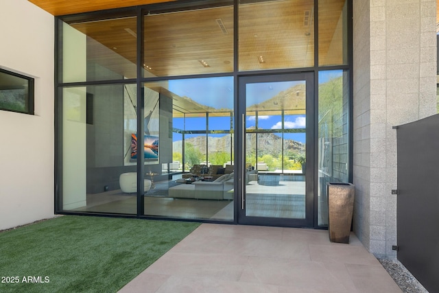 entrance to property with a mountain view