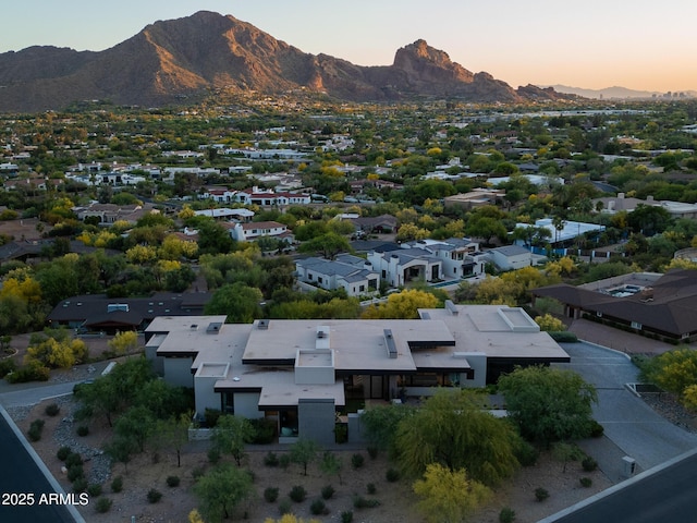 aerial view at dusk with a mountain view