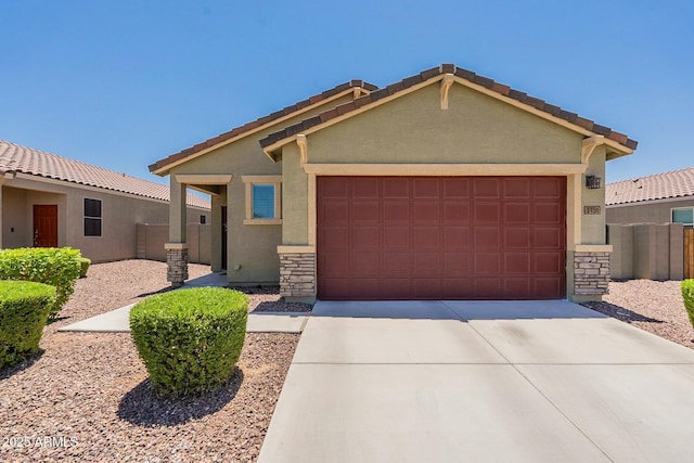 view of front of property featuring a garage