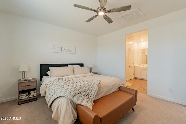 bedroom featuring carpet flooring, connected bathroom, and ceiling fan