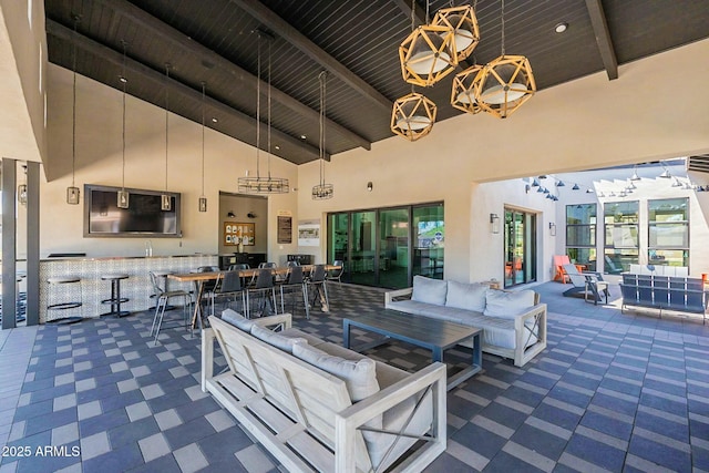 view of patio featuring outdoor lounge area and an outdoor bar