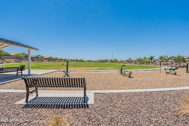 view of home's community with a lawn