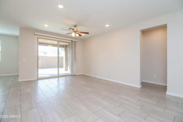 empty room with recessed lighting, baseboards, a ceiling fan, and wood tiled floor