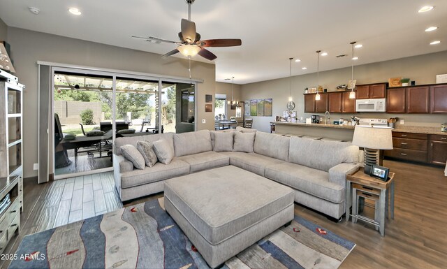 932 N Gomez St, Dewey, AZ 86327 - living room featuring recessed lighting, dark wood finished floors, and a ceiling fan