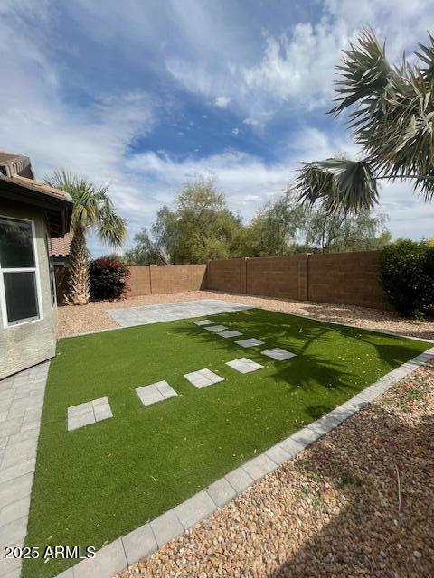view of yard featuring a fenced backyard