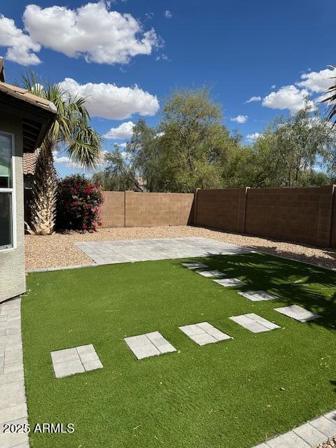 view of yard featuring a fenced backyard