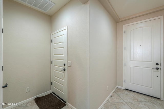 view of tiled foyer entrance