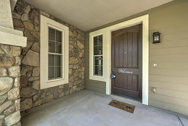 970 S Henry Ln, Gilbert, AZ 85296 - entrance to property with stone siding and covered porch