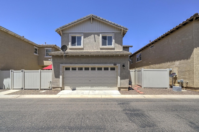 970 S Henry Ln, Gilbert, AZ 85296 - traditional-style house featuring a garage, a tiled roof, stucco siding, and concrete driveway