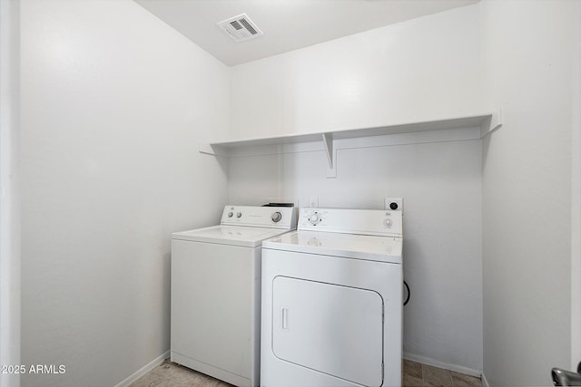 970 S Henry Ln, Gilbert, AZ 85296 - laundry room with washing machine and dryer and baseboards