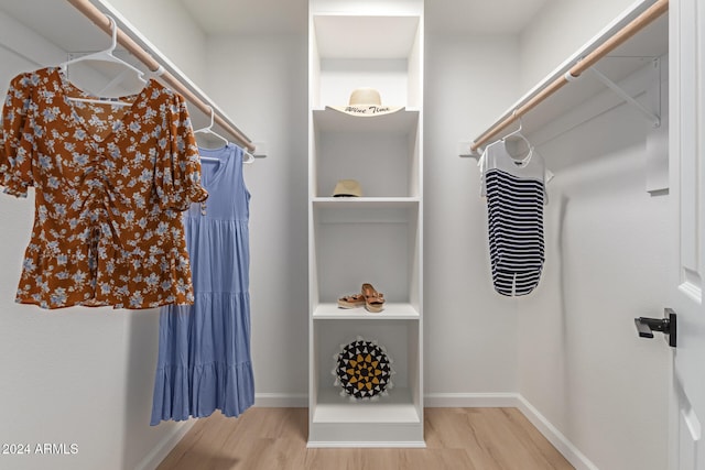 walk in closet featuring light wood-type flooring