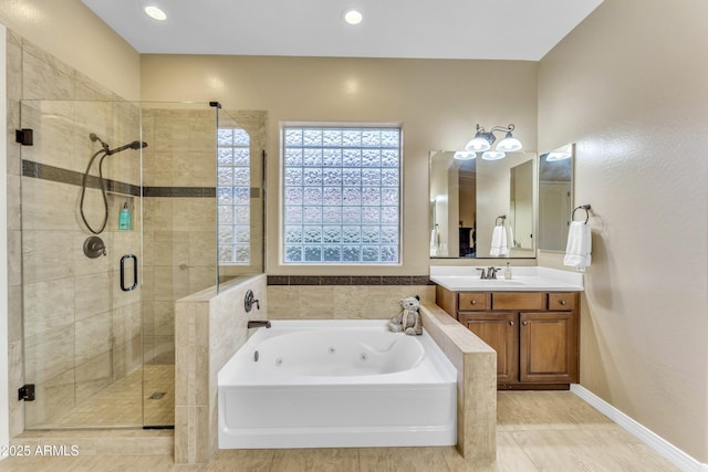 bathroom with vanity, shower with separate bathtub, and tile patterned flooring