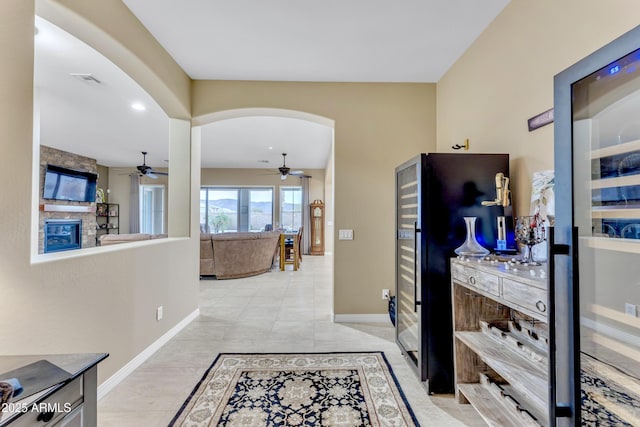 hallway featuring light tile patterned flooring