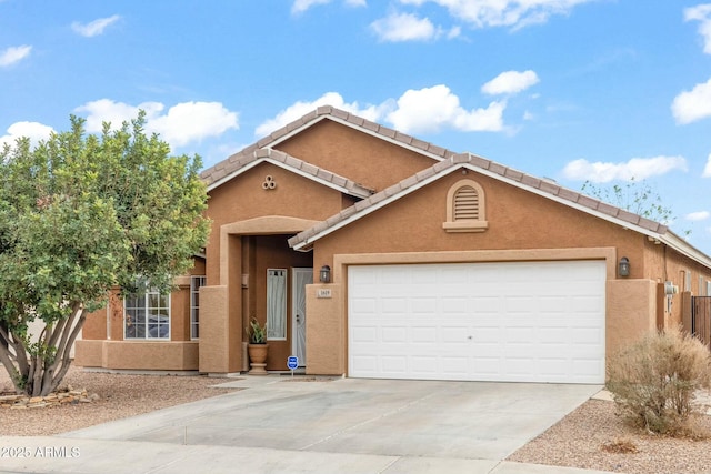 view of front of home with a garage