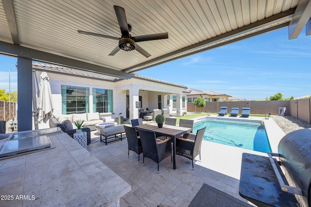 view of pool with outdoor dining space, a fenced backyard, a fenced in pool, an outdoor living space, and a patio