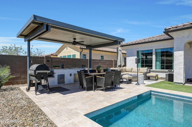 exterior space featuring outdoor lounge area, a fenced backyard, a fenced in pool, a ceiling fan, and a patio area