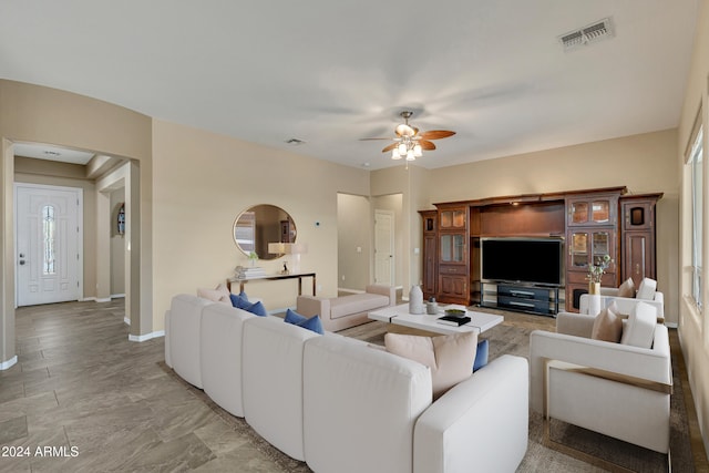 living room featuring ceiling fan