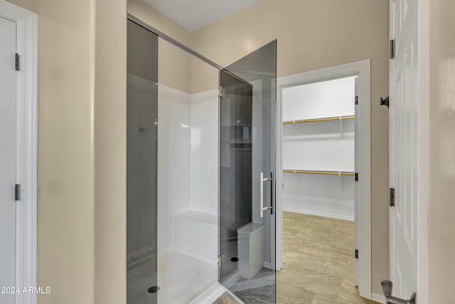 bathroom featuring walk in shower