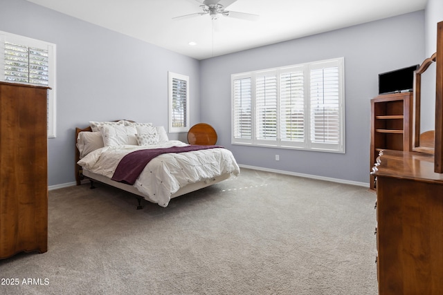 carpeted bedroom featuring ceiling fan, baseboards, and recessed lighting