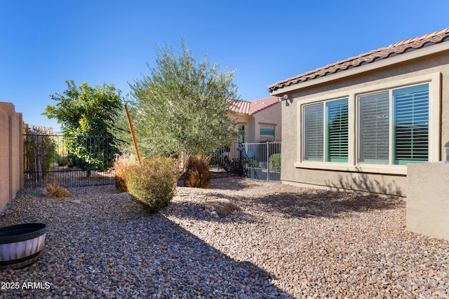 view of yard featuring fence