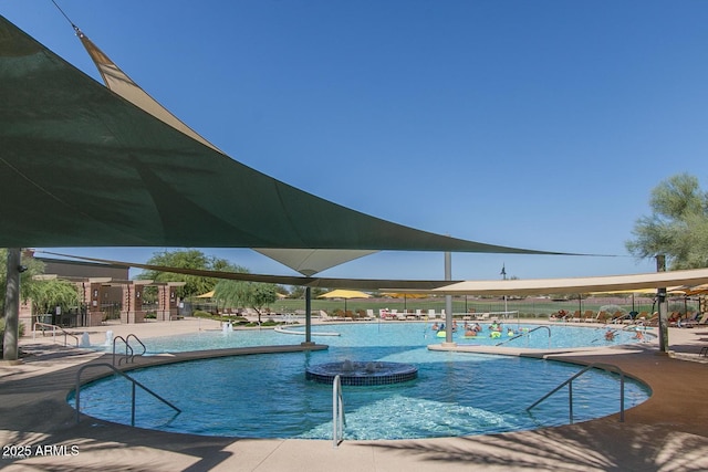 community pool with a patio