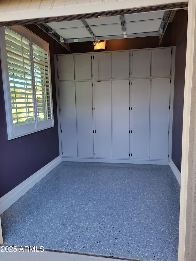 garage with baseboards