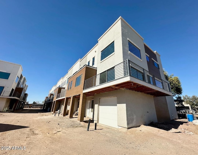 view of building exterior with a garage