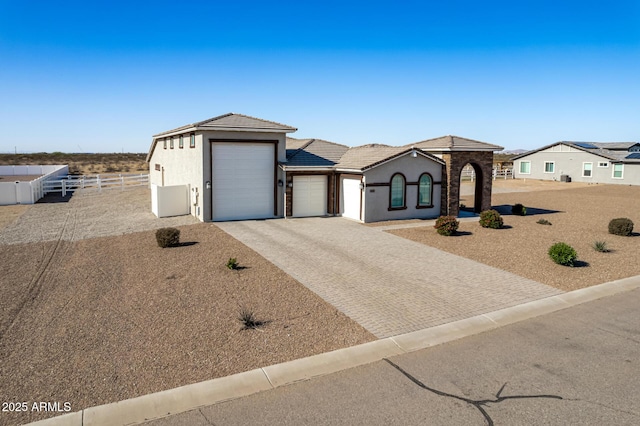 view of front of home featuring a garage