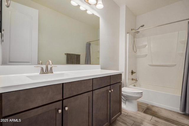 full bathroom featuring toilet, vanity, and shower / tub combo with curtain