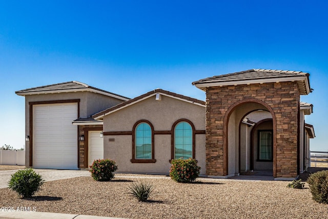 view of front of property featuring a garage