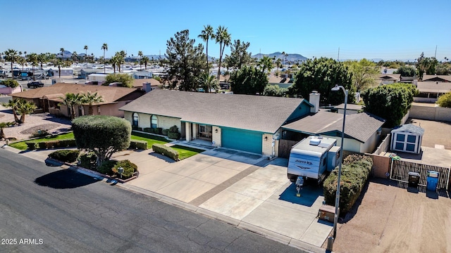 drone / aerial view with a residential view and a mountain view