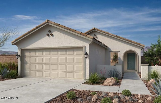 view of front of home with a garage