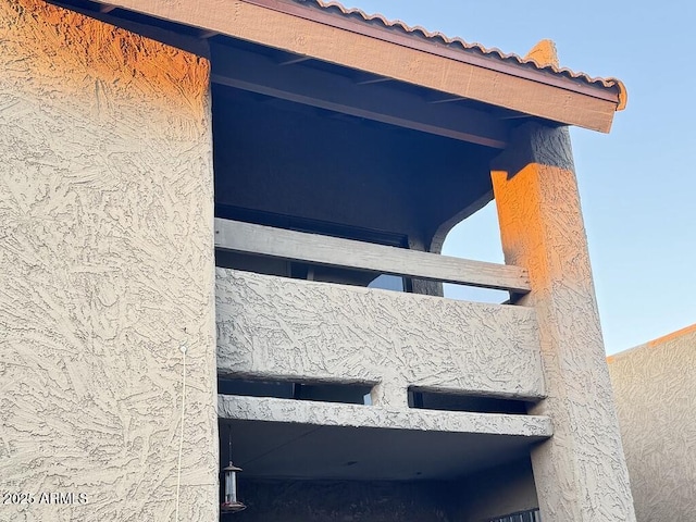 exterior details featuring stucco siding