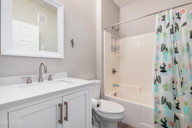 full bathroom featuring shower / tub combo, vanity, and toilet