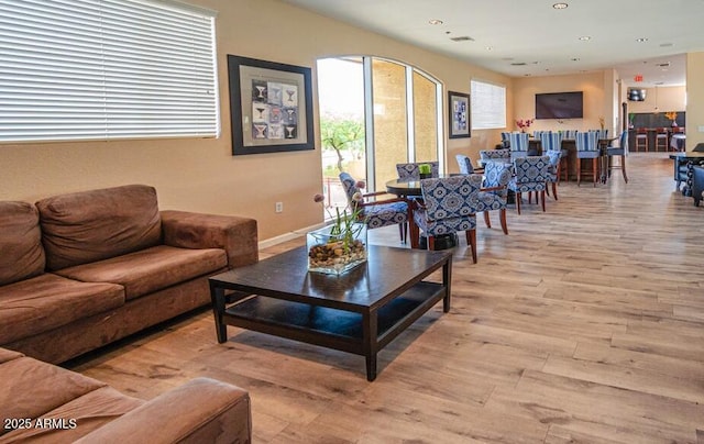 living room with light hardwood / wood-style floors