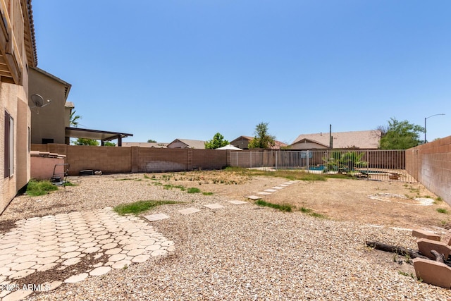 12825 W Virginia Ave, Avondale, AZ 85392 - fenced backyard featuring a patio