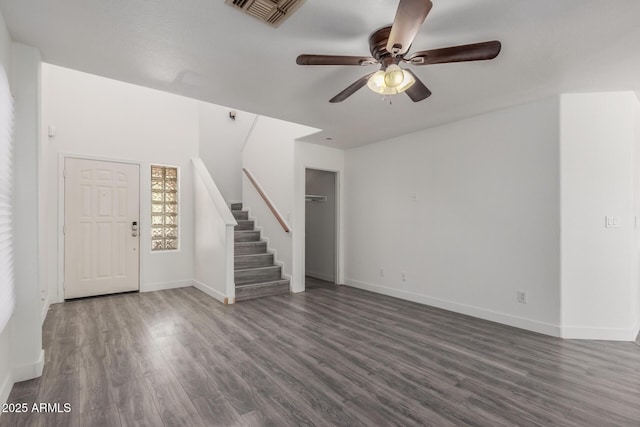 12825 W Virginia Ave, Avondale, AZ 85392 - unfurnished living room with stairway, wood finished floors, and ceiling fan