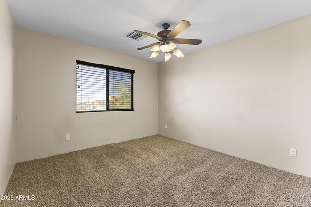 carpeted empty room with ceiling fan